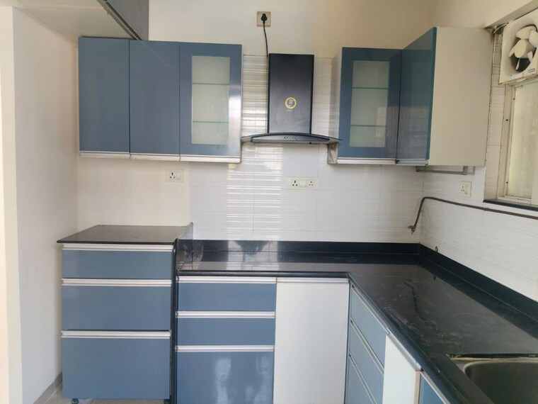 Kitchen, swiss-county 2 Bedroom 750 Sq.Ft. Apartment In Thergaon Pune 10554239