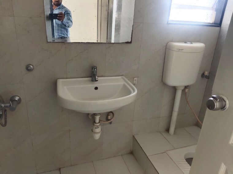 Bathroom, swiss-county 2 Bedroom 750 Sq.Ft. Apartment In Thergaon Pune 10554239
