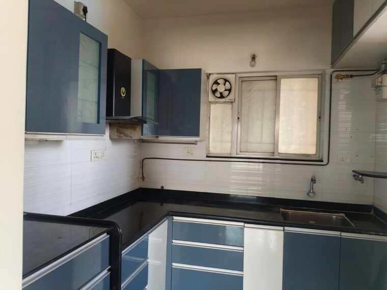 Kitchen, swiss-county 2 Bedroom 750 Sq.Ft. Apartment In Thergaon Pune 10554239