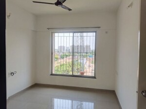 Room in 2 BHK Apartment at Swiss County, Thergaon – for Sale