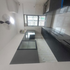 Kitchen in 2 BHK Apartment at Piramal Vaikunth, Balkum Pada – for Rent