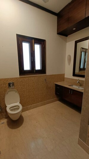 Bathroom in 4 BHK Apartment at Panchsheel Park – for Rent