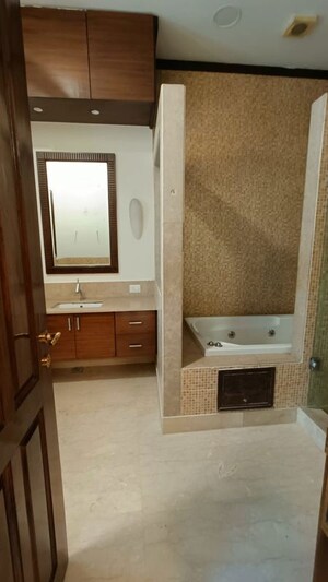 Bathroom in 4 BHK Apartment at Panchsheel Park – for Rent