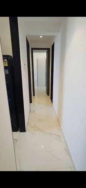 Building Lobby in 2 BHK Apartment at Dev Leo Tower, Oshiwara – for Rent