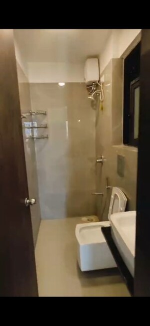 Bathroom in 2 BHK Apartment at Dev Leo Tower, Oshiwara – for Rent
