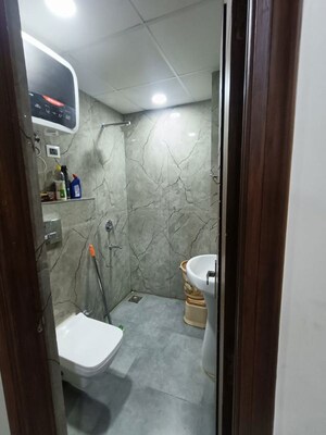 Bathroom in 3 BHK Builder Floor at Amolik Aster Woods, Sector 98 – for Sale