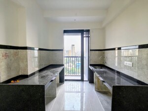 Kitchen in 3 BHK Apartment at Damji Shamji Mahavir Spring Tulip Phase 1, Pokhran Road No Two – for Rent
