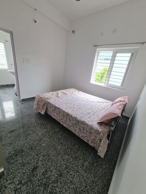 Bedroom in 2 BHK Apartment at Abhinandana Concorde, Puppalaguda – for Rent