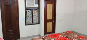 Bedroom in 2 BHK Builder Floor at Kalkaji – for Rent