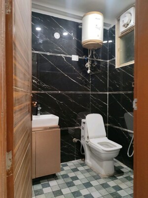 Bathroom in 1 BHK Builder Floor at Chattarpur – for Rent