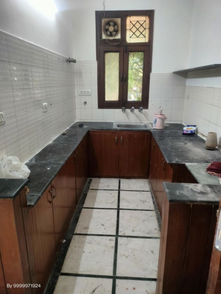 Kitchen, cghs-sahyog-apartments 2 Bedroom 1400 Sq.Ft. Apartment In Sector 56 Gurgaon 10423131