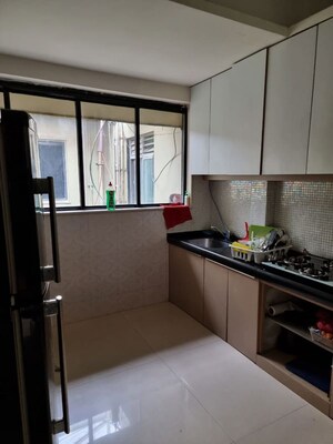 Kitchen in 2 BHK Apartment at Daulat Shirin CHS, Colaba – for Rent