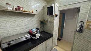 Kitchen in 2 BHK Apartment at Yashodham Complex, Goregaon East – for Sale