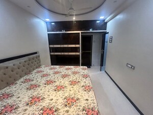 Bedroom in 2 BHK Apartment at Satellite Garden, Goregaon East – for Rent