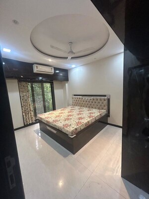 Bedroom in 2 BHK Apartment at Satellite Garden, Goregaon East – for Rent
