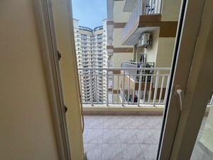 Balcony in 1 RK Apartment at Logix Blossom Zest, Sector 143 – for Sale