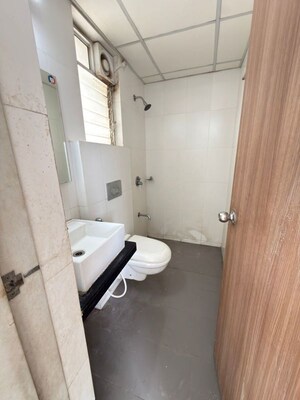 Bathroom in 1.5 BHK Apartment at Godrej Emerald, Ghodbunder Road – for Rent