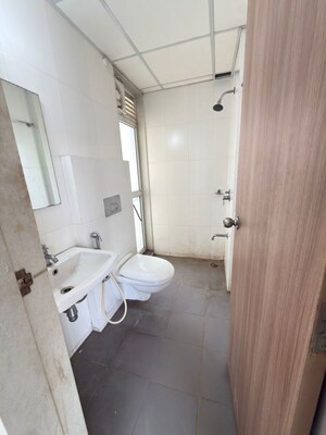 Bathroom in 1.5 BHK Apartment at Godrej Emerald, Ghodbunder Road – for Rent