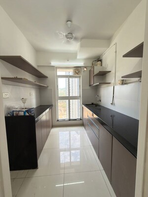 Kitchen in 1.5 BHK Apartment at Godrej Emerald, Ghodbunder Road – for Rent