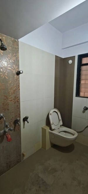 Bathroom in 2 BHK Apartment at Puranik City, Kasarvadavali – for Rent