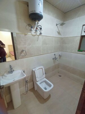 Bathroom in 1 RK Builder Floor at Ansal Sushant Shopping Arcade, Sector 27 – for Rent