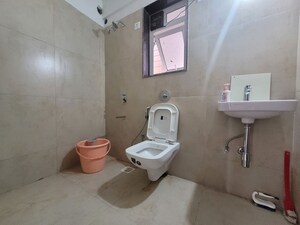 Bathroom in 1 BHK Apartment at Puranik City Reserva, Ghodbunder Road – for Rent