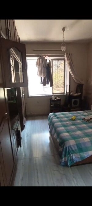 Bedroom in 1 BHK Apartment at Bela Court 1, Colaba – for Sale