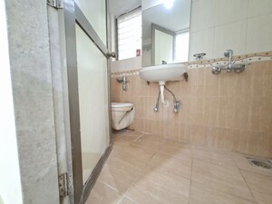 Bathroom in 2 BHK Apartment at Neelkanth Greens, Manpada – for Sale