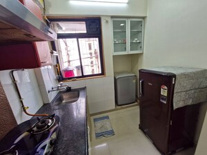Kitchen in 2 BHK Apartment at Puranik Hometown, Ghodbunder Road – for Rent
