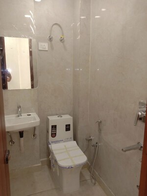 Bathroom in 2 BHK Builder Floor at Dwarka Mor – for Sale