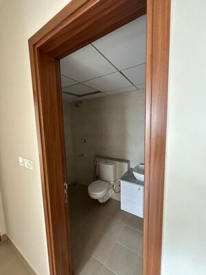 Bathroom in 3 BHK Apartment at Bhartiya Nikoo Homes Phase 2, Thanisandra Main Road – for Rent