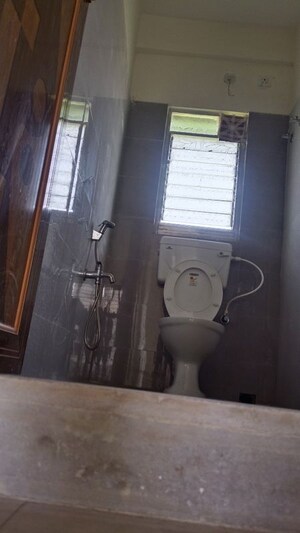 Bathroom in 2 BHK Apartment at Reekjoyoni Rajarhat – for Sale