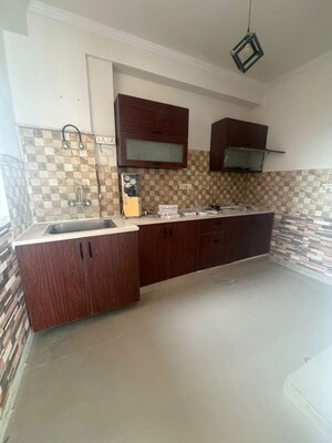 Kitchen in 3 BHK Apartment at C Dot Co operative Group Housing Society, Sector 56 – for Rent