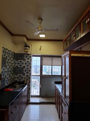 Kitchen in 3 BHK Apartment at Andheri CHS, Andheri West – for Rent