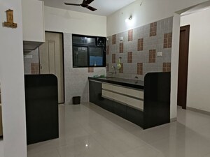 Kitchen in 2 BHK Apartment at Sharada Spandan Apartments, Warje – for Rent