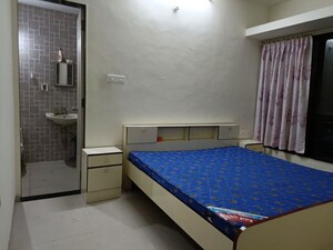 Bedroom in 2 BHK Apartment at Sharada Spandan Apartments, Warje – for Rent