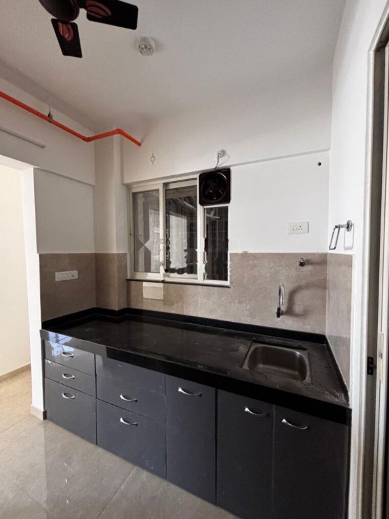 Kitchen, vj-yashone-infinitee 1 Bedroom 975 Sq.Ft. Apartment In Tathawade Pune 10555359