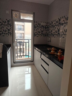 Kitchen in 2 BHK Apartment at Shubharambh Towers, Ghodbunder Road – for Rent