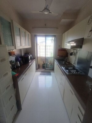 Kitchen in 2 BHK Apartment at Raj Residency Kasarvadavali, Kasarvadavali – for Rent