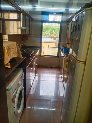 Kitchen in 1 BHK Apartment at Unnati Woods CHS, Kasarvadavali – for Rent