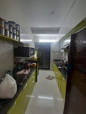 Kitchen in 2 BHK Apartment at Unique Greens Ghodbunder Road, Ghodbunder Road – for Rent