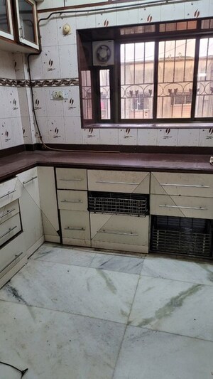 Kitchen in 1 BHK Apartment at Muktai CHS, Sion – for Sale