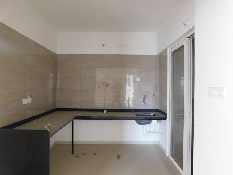 Kitchen, kolte-patil-little-earth 2 Bedroom 975 Sq.Ft. Apartment In Kiwale Pune 10555534