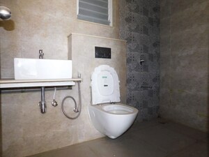 Bathroom in 2 BHK Apartment at Kolte Patil Little Earth, Kiwale – for Rent