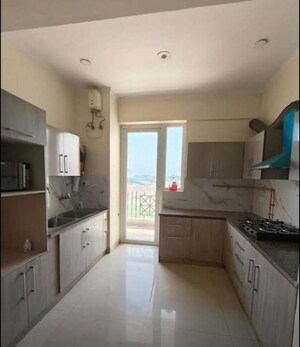 Kitchen in 3 BHK Apartment at Affinity Greens, International Airport Road – for Rent