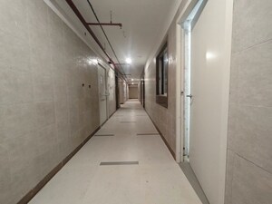 Building Lobby in 2 BHK Apartment at Arihant Aspire, Palaspe Phata – for Rent