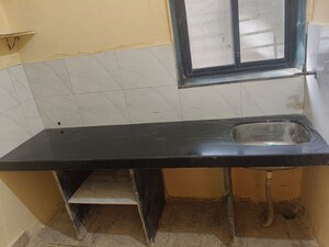 Kitchen in 2 BHK Apartment at Tulsi Pooja CHS, New Panvel East – for Rent