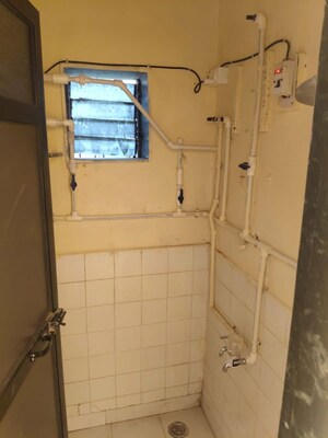 Bathroom in 2 BHK Apartment at Tulsi Pooja CHS, New Panvel East – for Rent