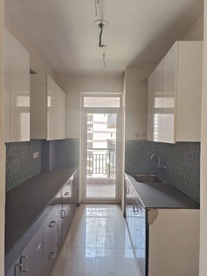 Kitchen in 2 BHK Apartment at Cosmos Express 99, Sector 99 – for Rent