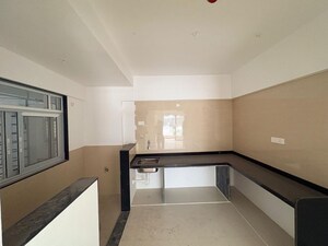 Kitchen in 2 BHK Apartment at Raga Top Towers, Wakad – for Rent